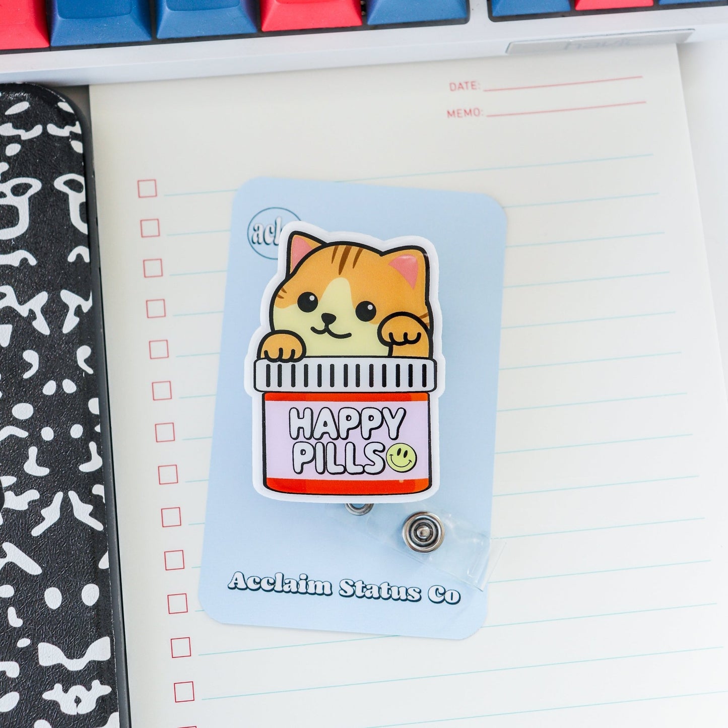 Badge Reel - Happy Pills Cat - Acclaim Status CoAcclaim Status CoAlligator Clip