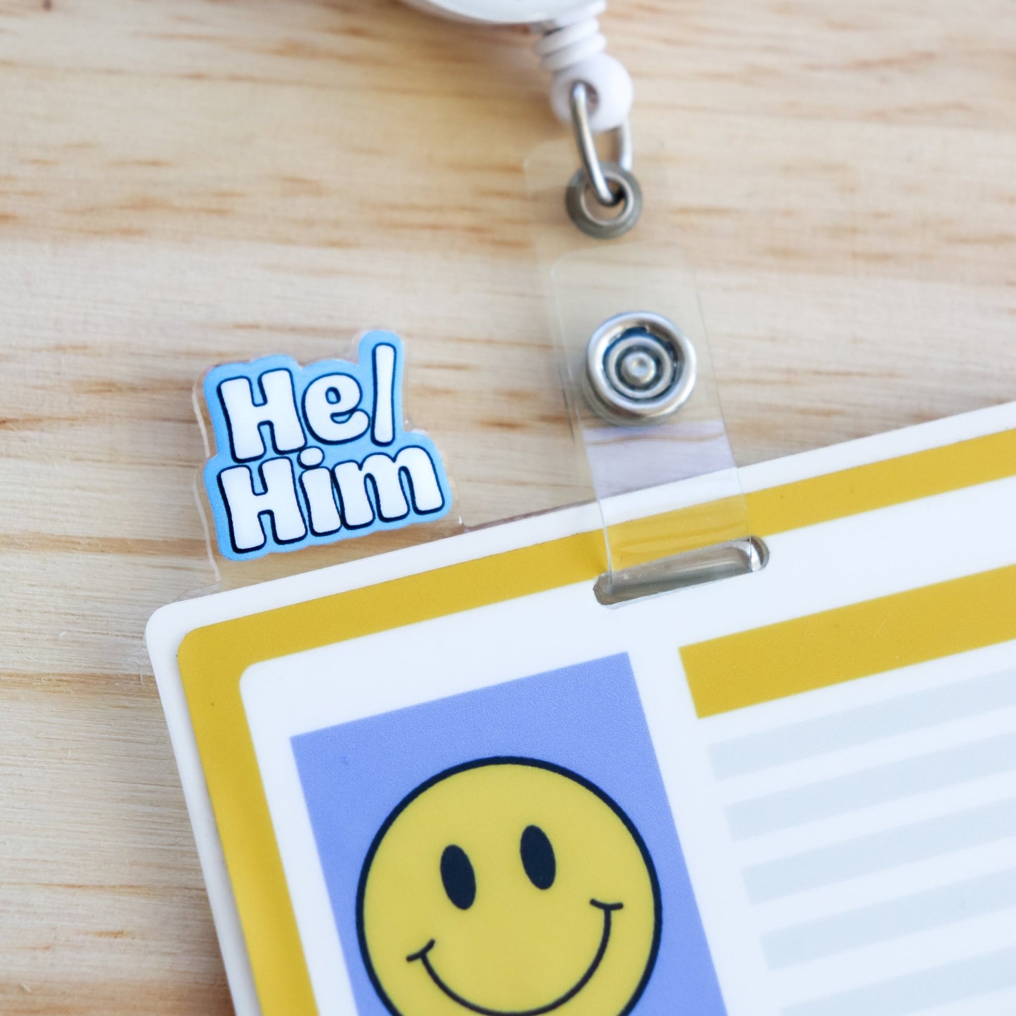 Badge Topper - Pronouns - Acclaim Status CoAcclaim Status CoHe/Him - BlueHorizontal Badge