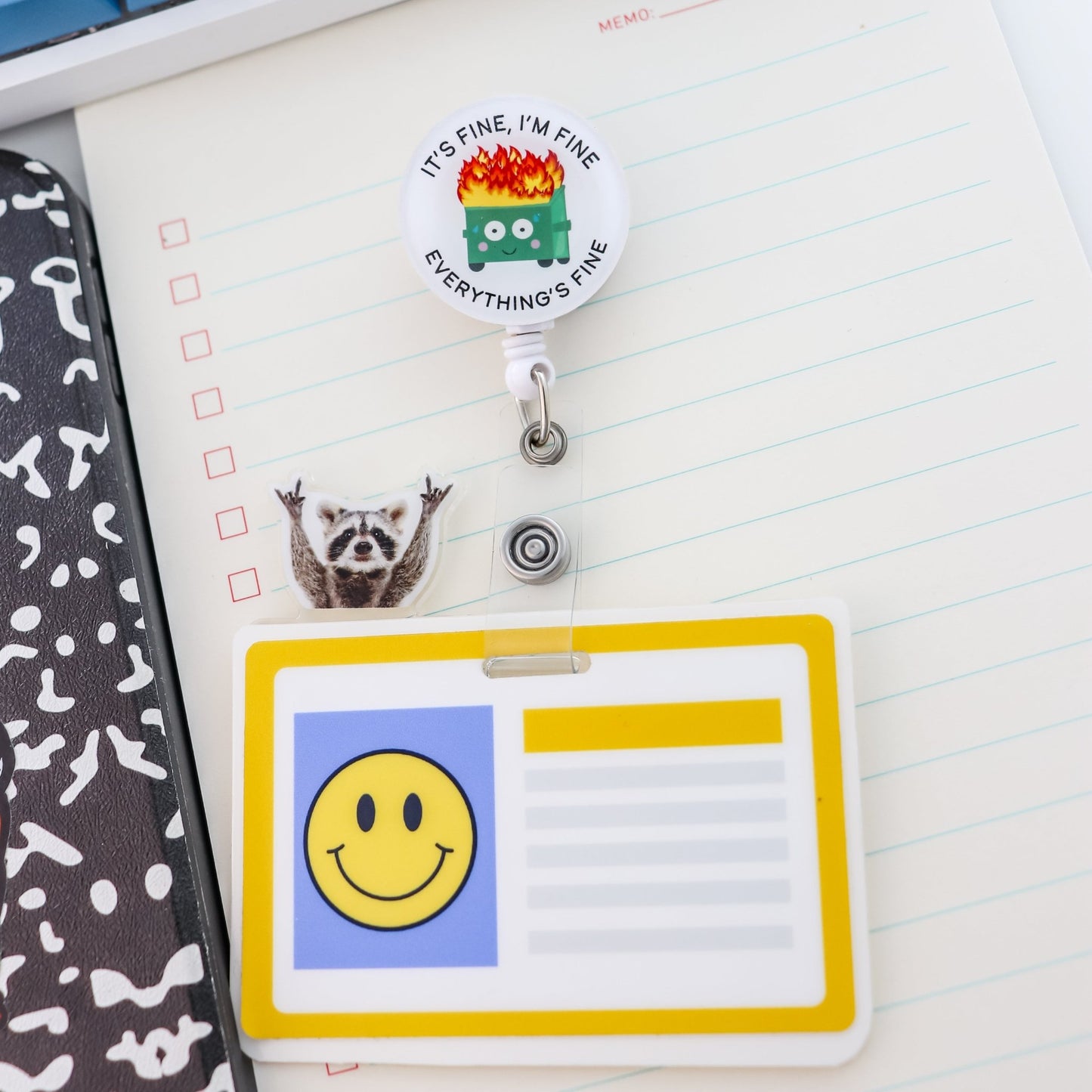 Cute raccoon badge topper on ID badge clip