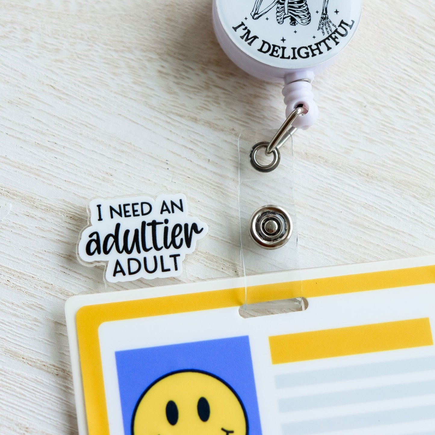 Badge Topper - I Need An Adultier Adult - Acclaim Status CoAcclaim Status CoBlack Font