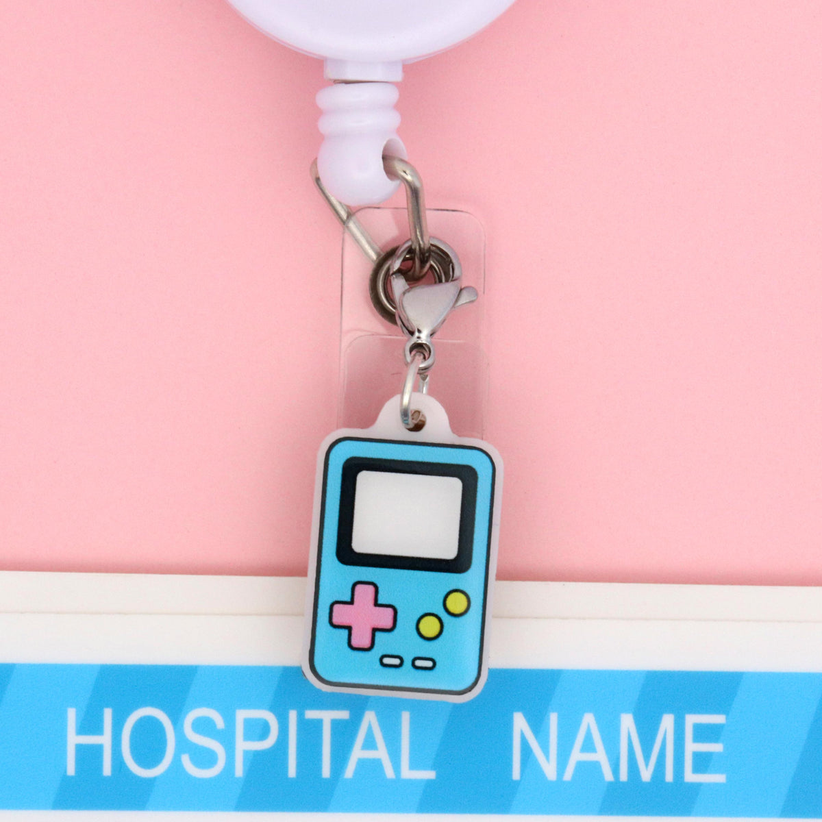 Retro Badge Reel Charm | Pink Pixel Heart 90s y2k Nostalgia Dangle Nurse Accessory