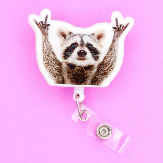 Badge Reel - Raccoon Hands Up - Acclaim Status CoAcclaim Status CoAlligator Clip