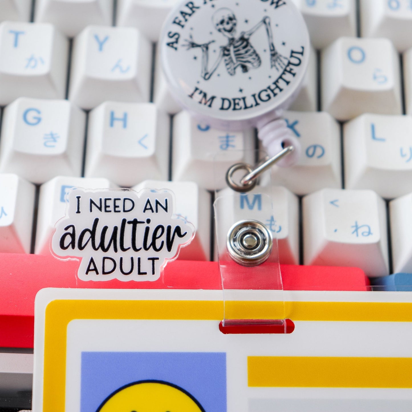 Badge Topper - I Need An Adultier Adult - Acclaim Status Co Acclaim Status Co Black Font